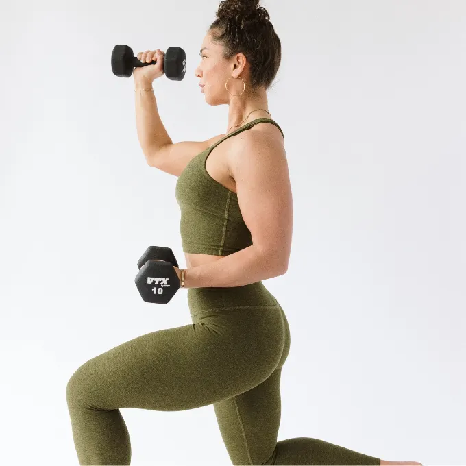 b3 strength instructor in a lunge