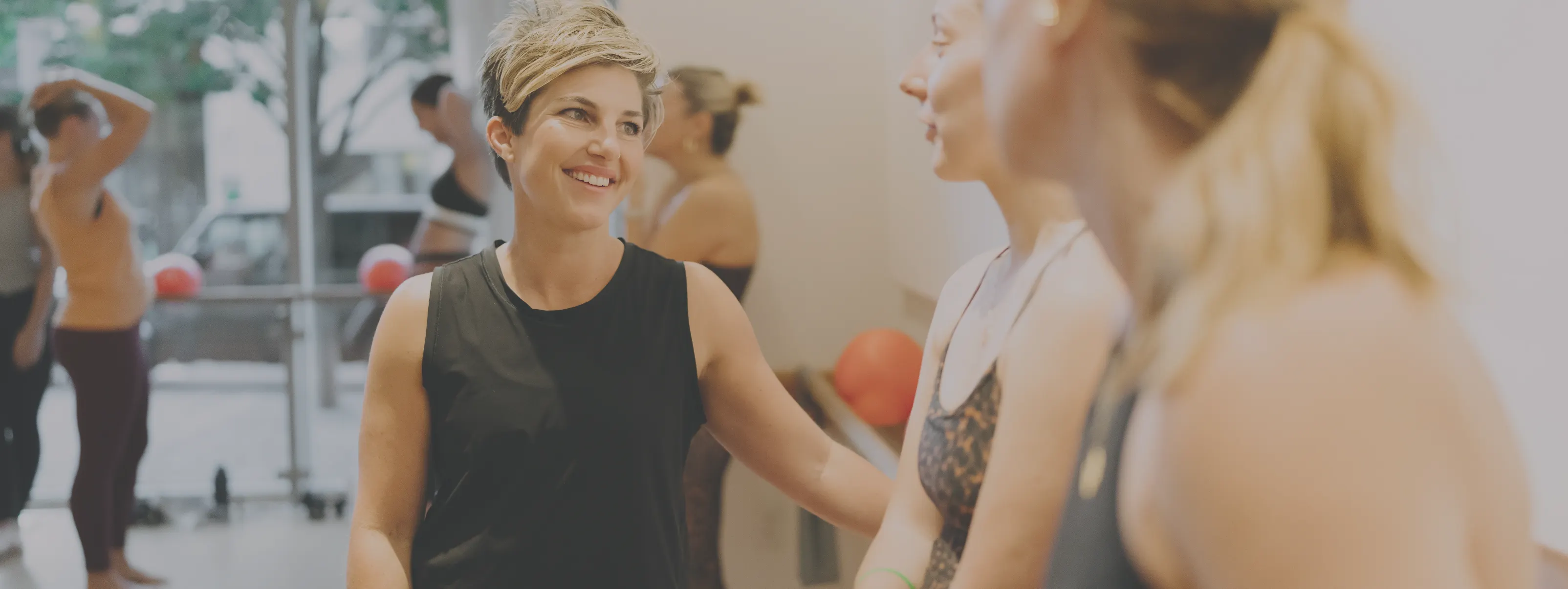 barre3 owners gather during a class