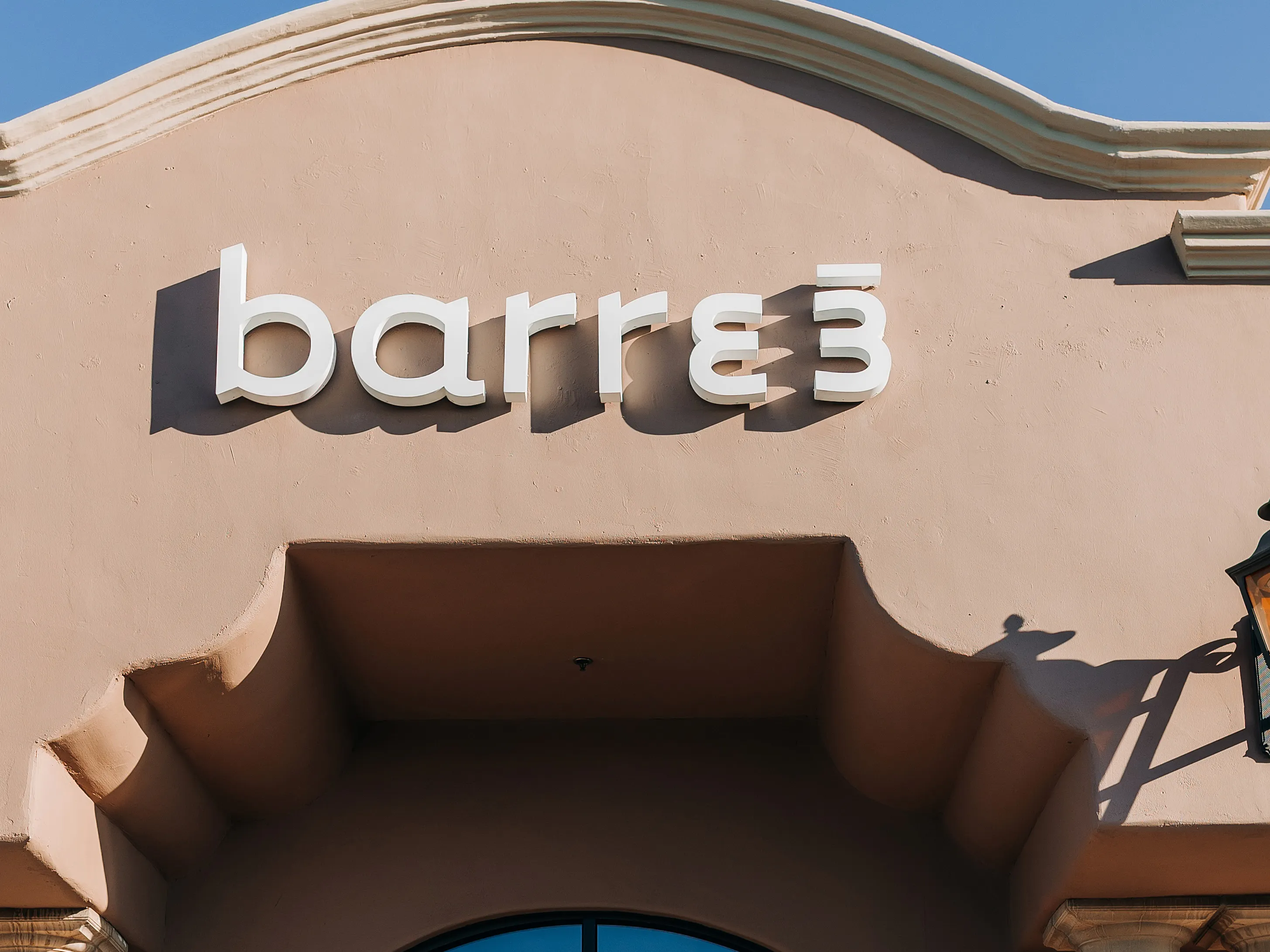 showing exterior of barre3 Tucson Foothills with the barre3 sign